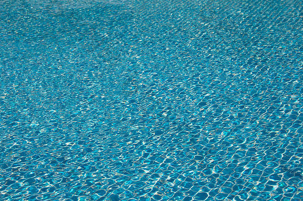 游泳池太阳反射蓝色的马赛克背景