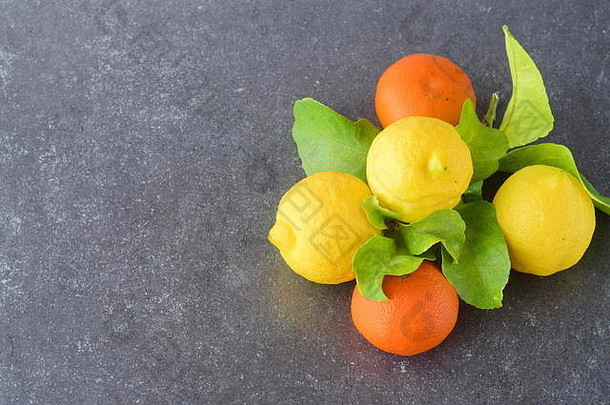 柑橘类集合新鲜的橙子柠檬官员灰色摘要背景地中海生活方式健康的食物