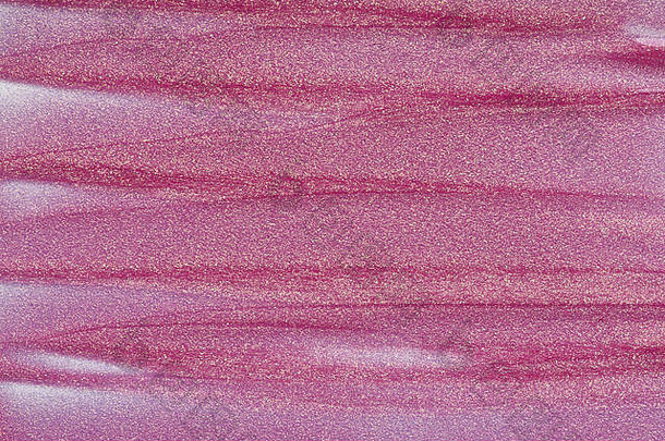 白色背景中口红或丙烯酸漆的珠光粉红涂片和质地