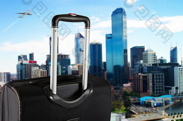墨尔本市的手提箱。旅游理念