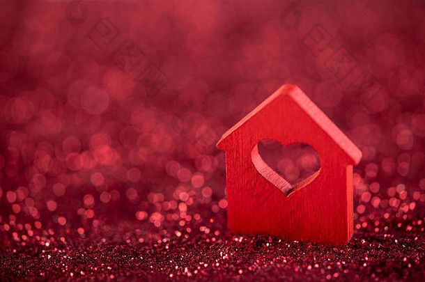 小房子心形状红色的闪闪发光的背景