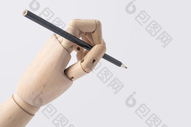 商业和设计理念-白色背景上隔离的木制手持笔