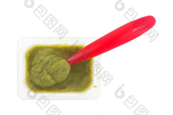 前视图塑料容器绿色豌豆婴儿食物红色的勺子插入mush孤立的白色背景
