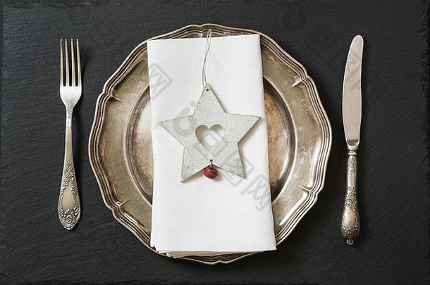 圣诞节表格设置古董餐具银器<strong>明星</strong>装饰前视图圣诞节装饰