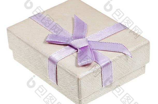 白色背景上带粉红结的闪亮纸质礼品盒