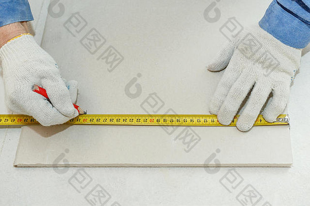 手工人磁带测量铅笔干墙