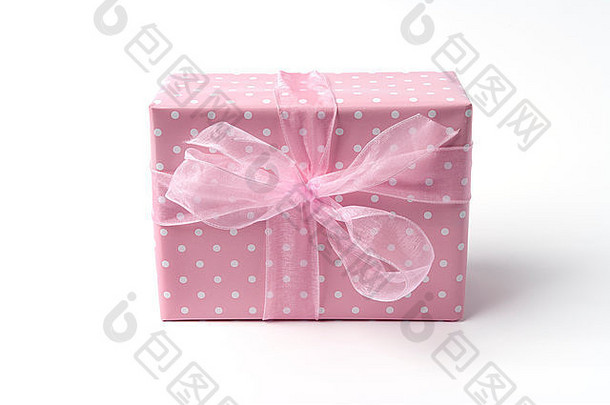 白色背景的粉红色婴儿礼物送给新生女孩
