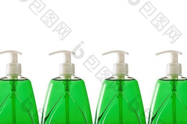 白色背景上的塑料瓶中的绿色液体肥皂