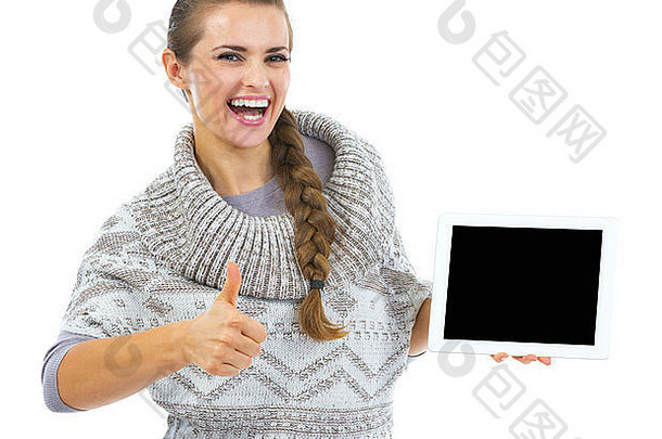 微笑年轻的女人毛衣圣诞节他平板电脑空白屏幕显示拇指