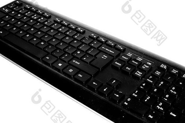 白色背景上隔离的黑色无线计算机PC键盘