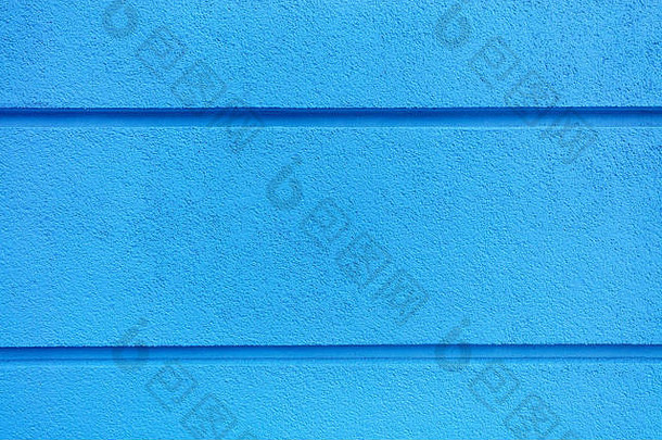 混凝土墙纹理彩色的明亮的蓝石建设coat-plaster使绝缘材料墙水平分groov