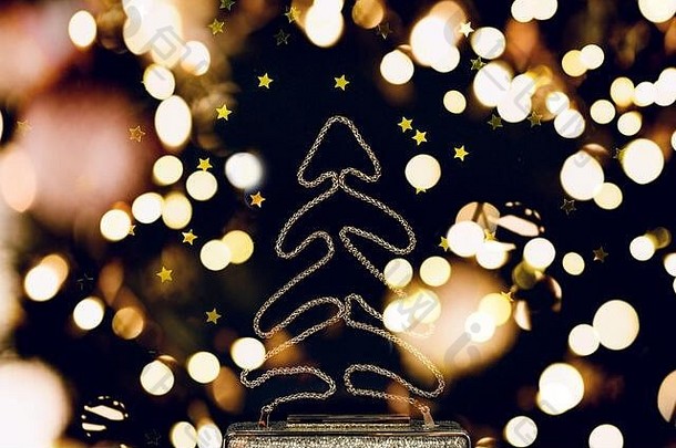带有星星点缀的节日夜晚金色离合器。节日和庆典背景。豪华配件和派对理念。圣诞节和新年庆祝活动。带节日灯饰的水平灯