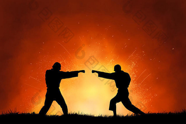 男子剪影在日落的天空前展示武术格斗的抽象照片