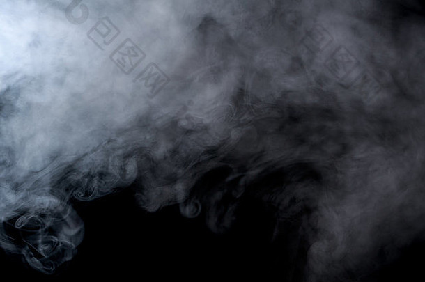 黑色背景上的抽象烟雾。纹理设计元素。抽象艺术。水烟。微距拍摄。