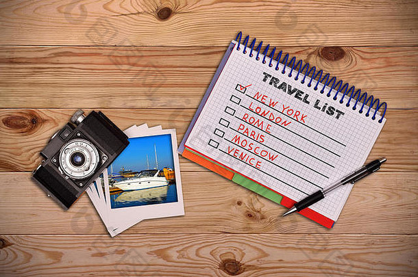 相机照片记事本画旅行列表工作桌子上旅游