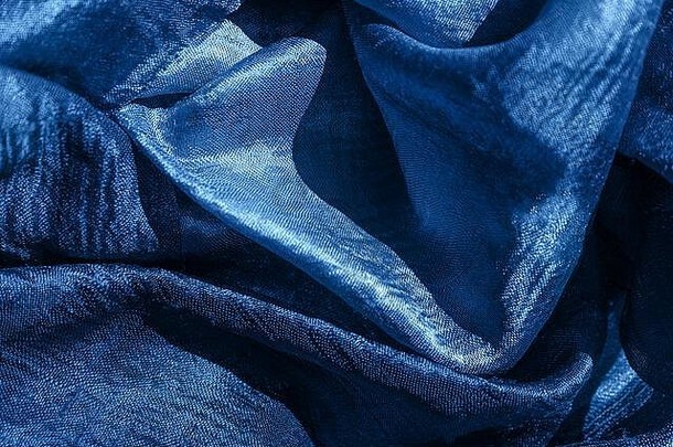 蓝色的颜色登记蓝色的丝绸纹理礼物概念