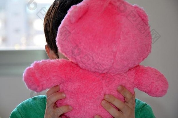 孩子粉红色的泰迪熊