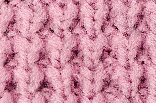 粉色针织羊毛纹理可以用作背景。