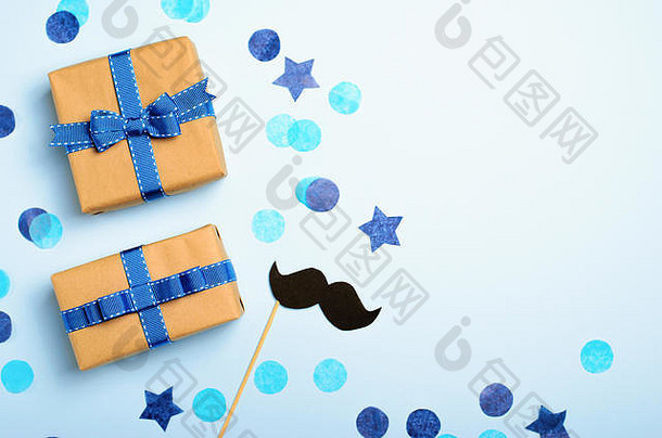 礼物盒子胡子蓝色的背景父亲的一天概念