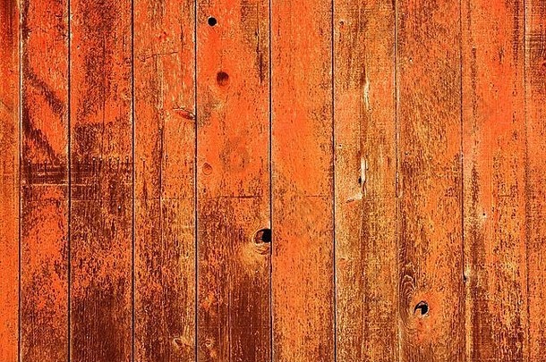 红色漆木背景。陈年红漆木板木墙背景。