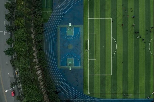 西南都市重庆市学校足球篮球场空中俯拍