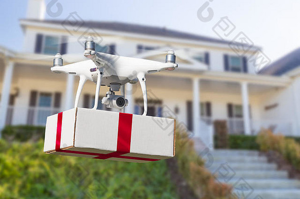无人机系统（UAV）四旋翼无人机，带红丝带送箱回家