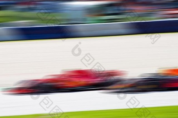 F1赛车，快速超车，赛车运动，背景模糊，赛车图片