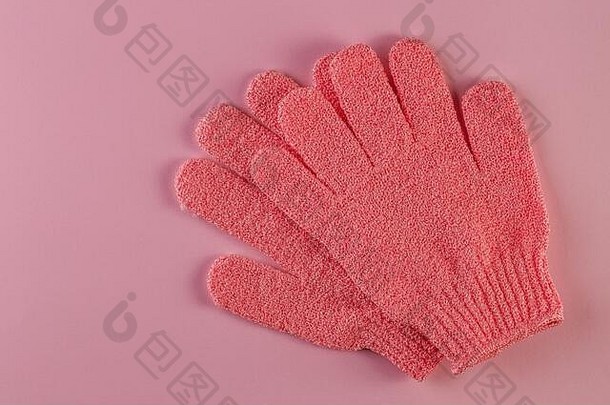 一对粉红色的按摩手套淋浴粉红色的背景手套淋浴按摩擦洗<strong>美背</strong>景化妆品连续
