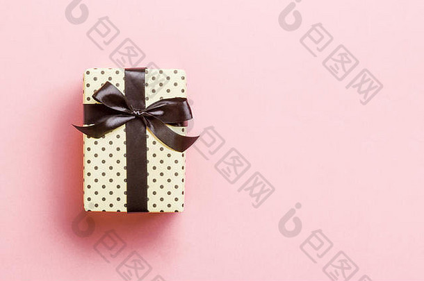 礼物盒子黑色的弓圣诞节一年一天粉红色的背景前视图复制空间