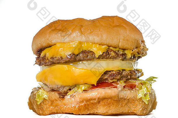 恶心、油腻、不健康的垃圾食品芝士汉堡-不健康快餐饮食的概念图