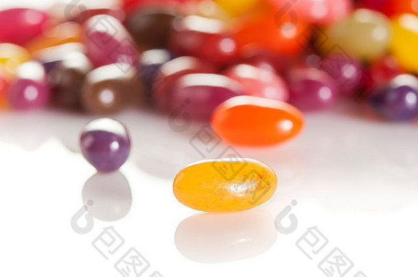 色彩斑斓的混合水果果冻豆子背景