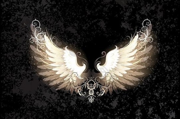 发光的天使翅膀，用深色纹理背景上的图案装饰。