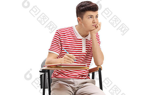无聊青少年学生坐着学校椅子孤立的白色背景