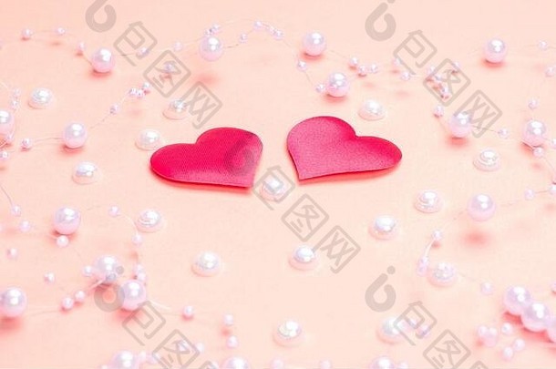 粉红色背景上的粉红色心形图案。情人节。设计师的空白。情人节的概念。贺卡。香料。