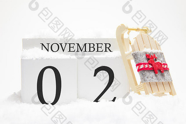 秋天日历使木多维数据集日期11月概念雪未来假期特写镜头