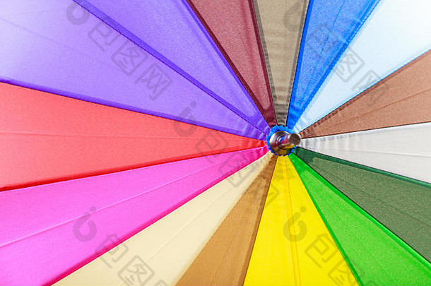 图案和纹理概念。彩虹色彩色伞伞的详细特写。