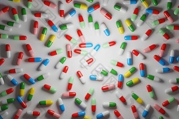 白色背景上的五彩药丸。医疗、医药行业概念。数字3D渲染。