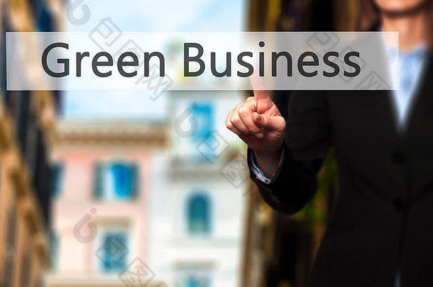 绿色业务女商人手紧迫的按钮触摸屏幕接口业务技术互联网概念股票照片