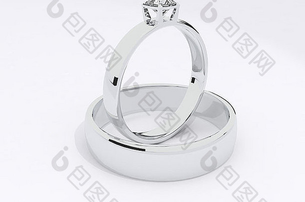 两枚白金戒指和一枚钻石戒指分别镶嵌在白色