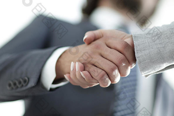 商务会议成功后商人握手