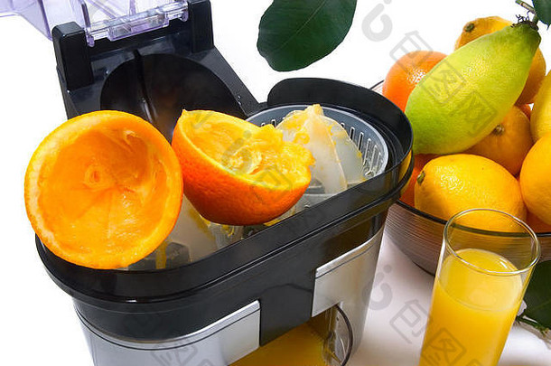 电榨汁机挤压橙子柠檬葡萄柚拍摄工作室白色背景
