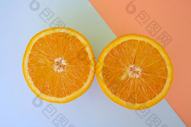 橙色橘子片捕获开销色彩斑斓的好玩的背景婴儿蓝色的米色颜色