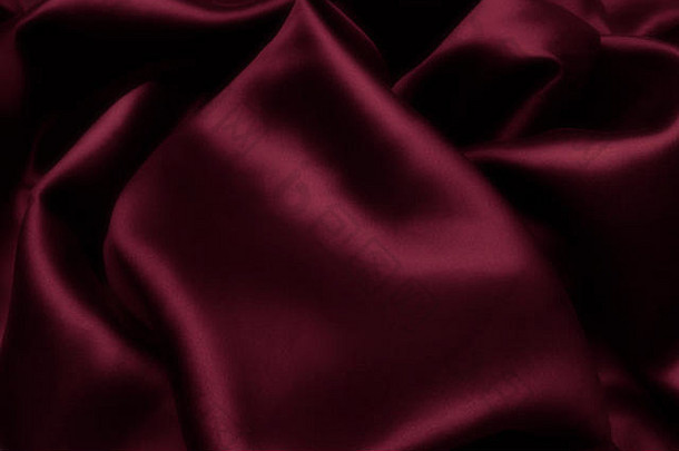 红色的缎丝绸优雅的织物背景