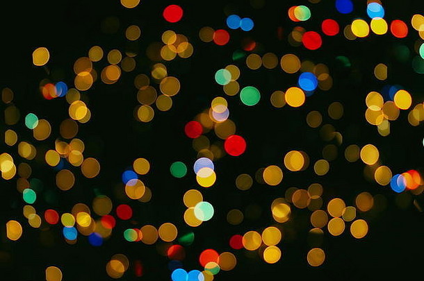 闪闪发光的发光灯泡灯背景模糊圣诞节壁纸装饰概念假期节日背景闪耀圆基斯庆祝活动它