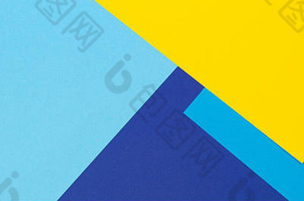 抽象蓝黄彩色纸几何组成背景