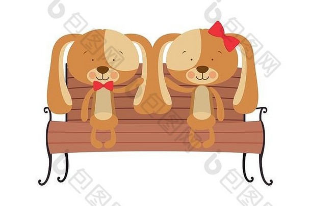 可爱的两只狗坐在公园的椅子上
