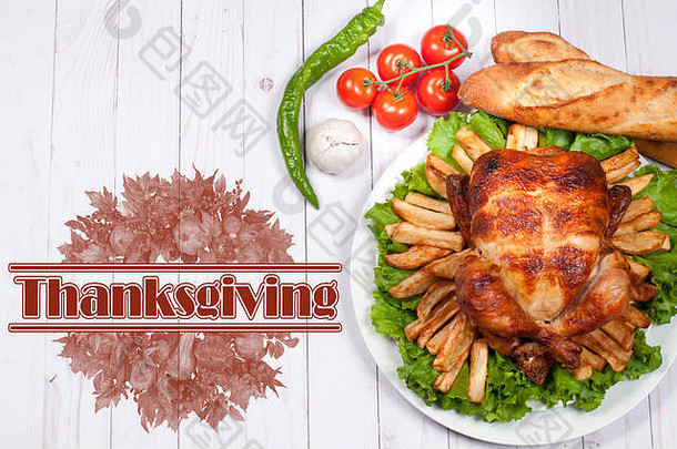 感恩节或圣诞节。的烤火鸡放在木桌上。感恩节庆典传统晚餐设置食物概念