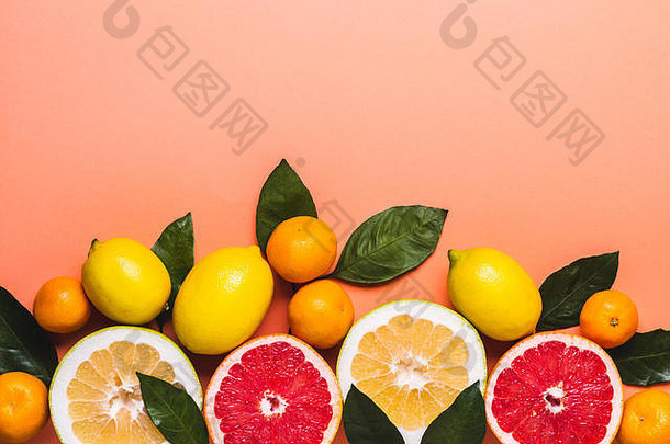 活珊瑚背景，新鲜柑橘类水果。健康食品概念。