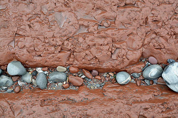 细节枯萎的红色的砂岩脊完整的海滩鹅卵石watchet海滩萨默塞特