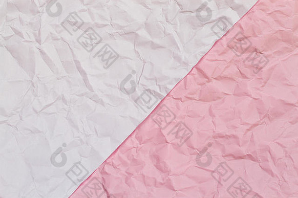 粉红色的白色皱巴巴的皱纹纸纹理背景